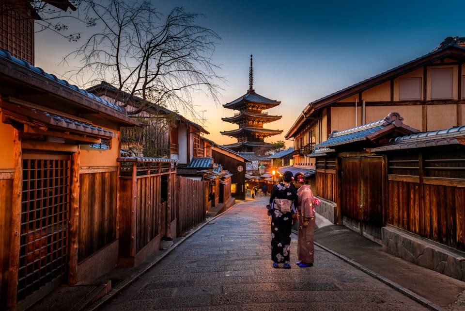 Traditional Japanese street beneath Mount Fuji